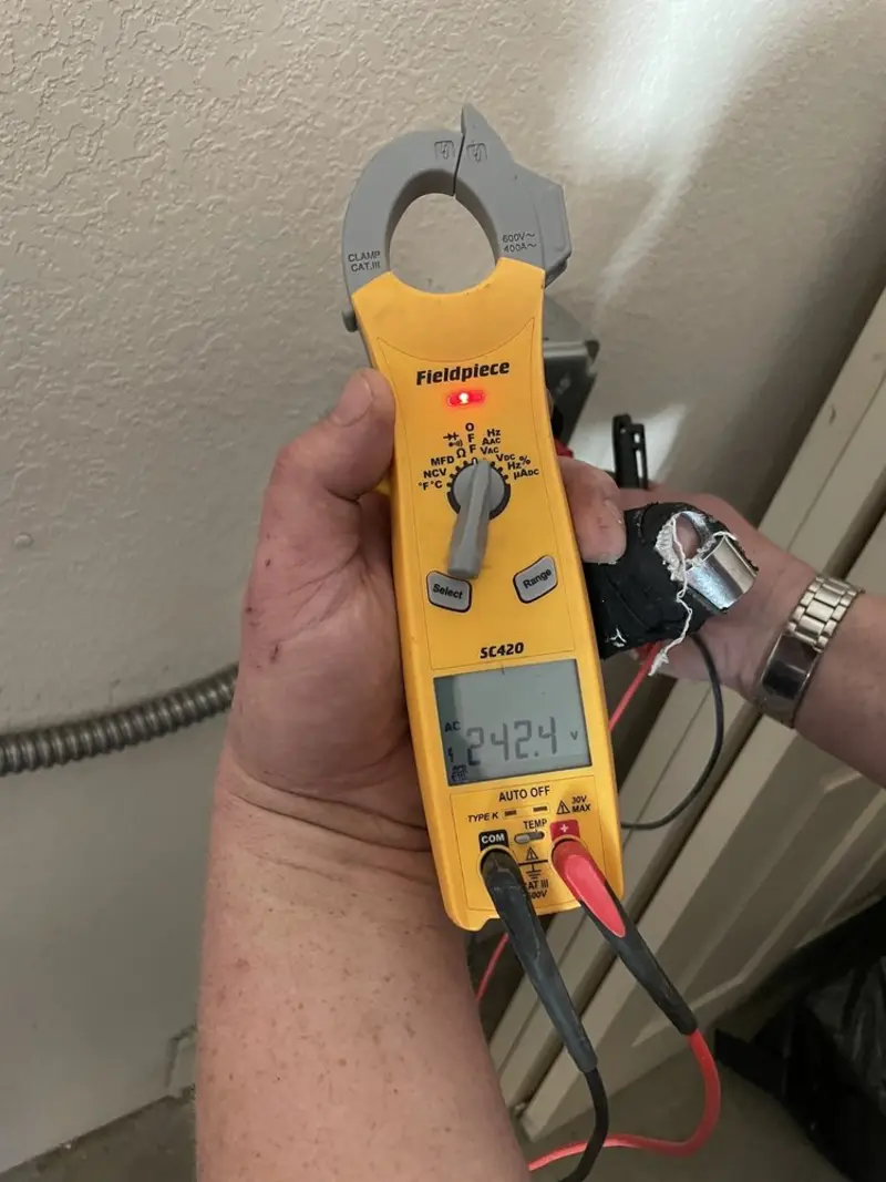 Voltage testing with clamp meter during Hot Tub / Pool Electrical Wiring in Lockwood